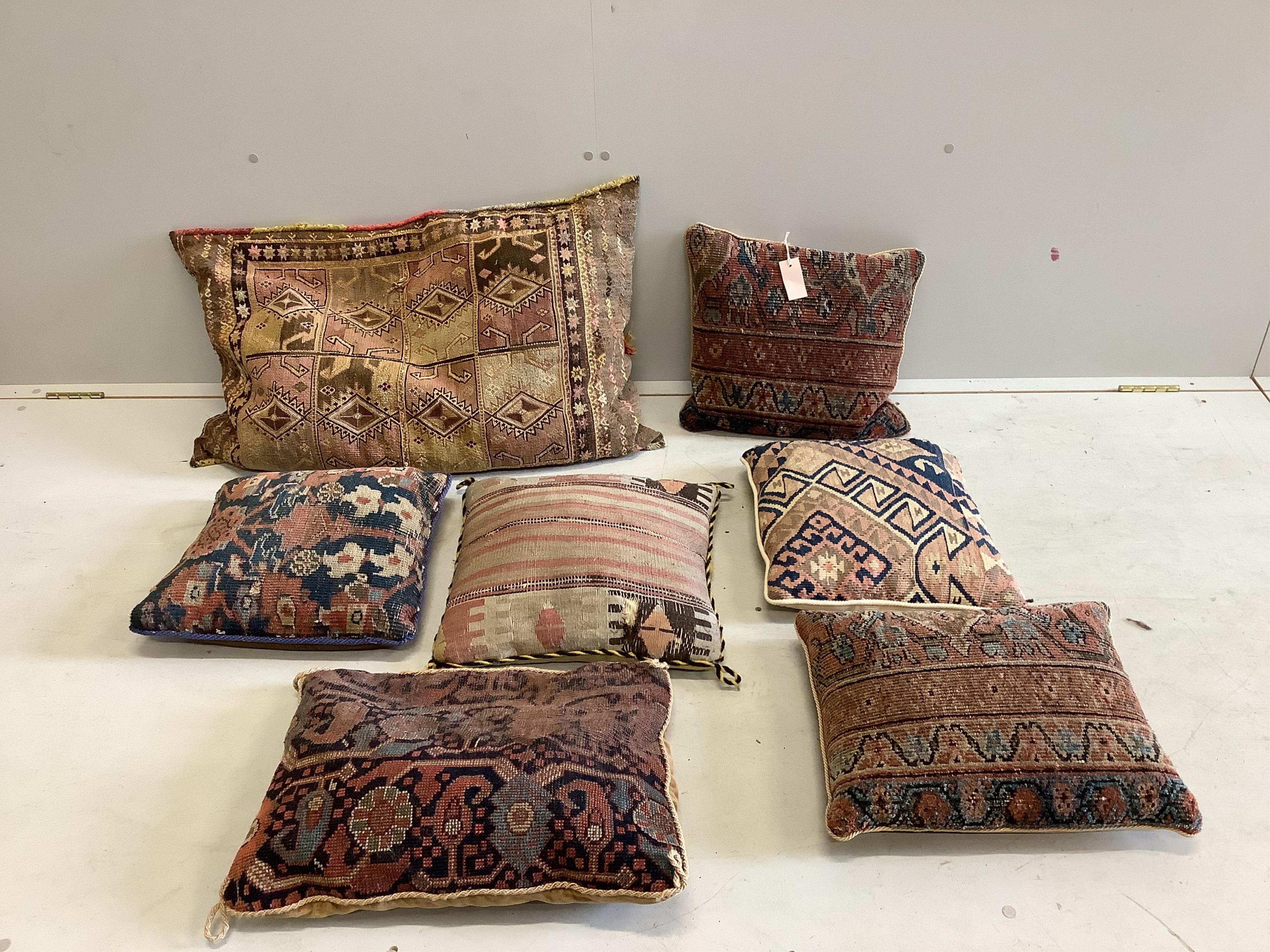 Seven Caucasian Kelim cushions. Condition - fair